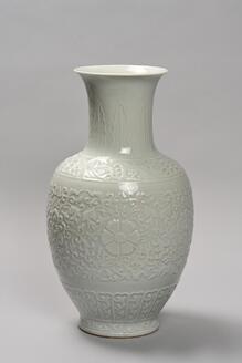 Vase, White porcelain with stamped arabesque design