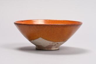 Bowl, Yellowish brown glaze with stamped arabesque design
