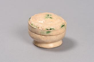 Covered Box, White porcelain with green spots and molded ornaments