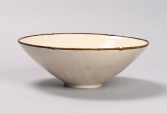 Bowl, White porcelain with molded flowering plants