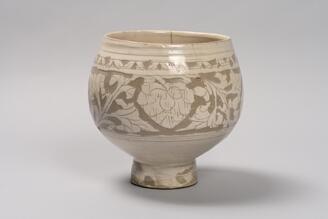 Bowl, Transparent glaze on white slip with peony arabesque design in sgraffito