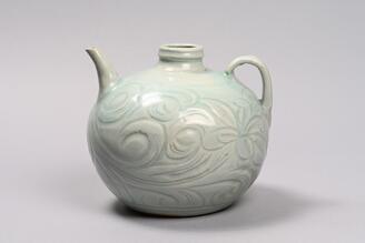 Ewer, White porcelain with carved arabesque